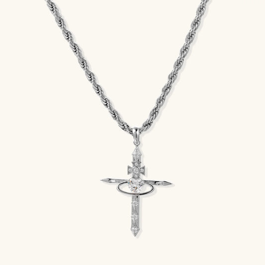 Silver-tone necklace with dimensional orb pendant, cross crown detail, and zirconia stones on twisted rope chain