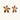 Gold-plated brass flower earrings with brown tortoiseshell enamel petals on cream background