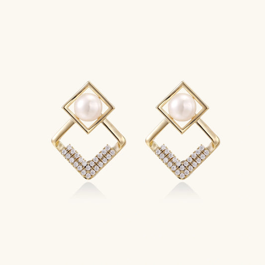Gold-plated double square frame earrings with freshwater pearl and crystal accents on white background