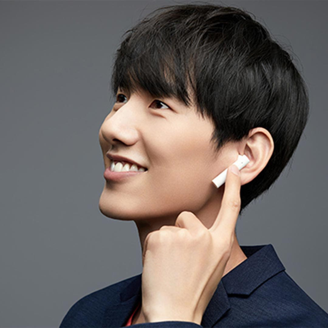He-is-changing his-song-on-earphone
