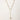 Adjustable gold lariat necklace with freshwater pearls nested in delicate cage settings and Y-shaped tassel drop