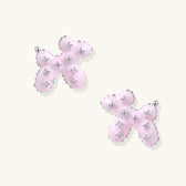 Glossy pink enamel balloon dog stud earrings with crystal details on white gold plated brass, museum-inspired design