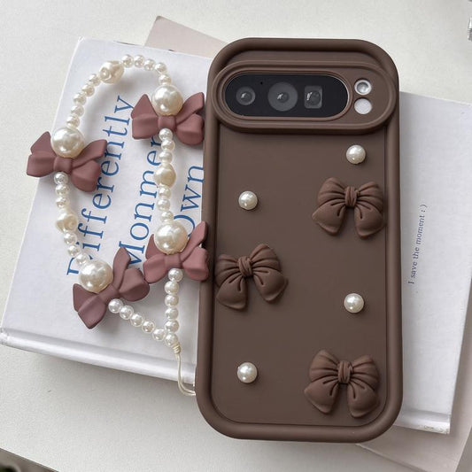 Soft Silicone 3D Bowknot Pearl Phone Case with Beaded Wrist Strap, For Google Pixel 9 Pro XL, For Google Pixel 9 Pro, For Google Pixel 9, For Google Pixel 8a, For Google Pixel 8 Pro, For Google Pixel 8, For Google Pixel 7a, For Google Pixel 7 Pro 5G